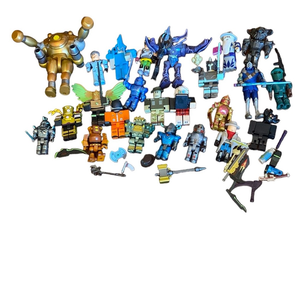 Lot of over 50 pieces (figures weapons body parts) of Roblox characters